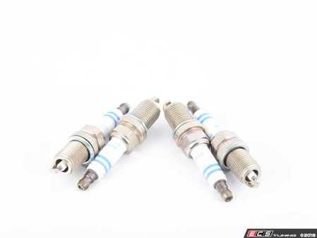 ES#2794936 - 0031599703KT8 - Spark Plugs - Set Of Four - Ignites the air and fuel mixture inside of your engine - Bosch - Mercedes Benz