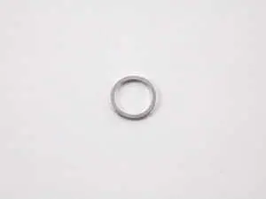 Torque converter drain plug sealing ring