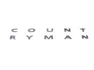 ES#3651430 - 51142465243 - "COUNTRYMAN" Model Lettering For Countryman - Piano Black - Mounts to the trunk lid Used as an upgrade: Black Line - Genuine MINI - MINI