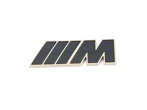 ES#4488782 - 51145A3F9B3 - BMW M Emblem - Stylish black over gold design from the iX! - Genuine BMW - BMW
