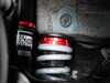 ES#4475498 - 000465LA01 - E82/E88 Performance Adjustable Coilover System - Dial in your suspension with 32 way adjustable damping coilovers to improve the Performance, and Style of your 1 series! - ECS - BMW