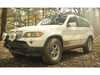 ES#4707738 - 048520la01KT - E53 Rock Slider Set - Replace your flimsy plastic rocker panels with a rugged steel casing to protect your underbody and have confidence in your off-roading capabilities! - ECS - BMW