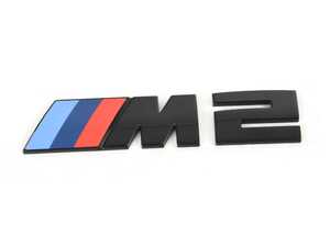 ES#4713490 - 51145A76513 - BMW G87 M2 Trunk Emblem - Black  - Sleek black trunk emblem for BMW G87 M2, bold, sporty. - Genuine BMW - BMW