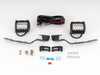 ES#5376014 - 057403la02KT - E70 Ditch Light Brackets & LED Lighting Package - Position auxiliary lights cleanly for secure, vibration-free illumination ahead and to the side of the vehicle. Shares existing factory hood hinge mounting location. Includes 4" LED pod lights & wiring! - ECS - BMW