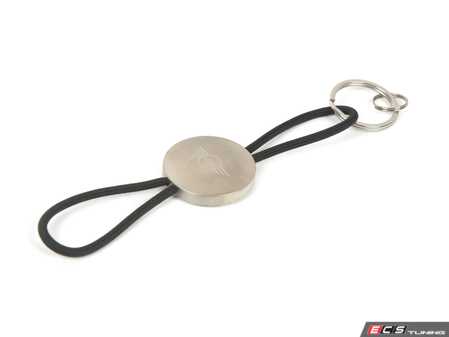 ES#4788457 - 80275B320E7 - MINI Cooper Keyring - Wings Logo - MINI logo in metal with loop fabric to hang on the key - Genuine MINI - MINI