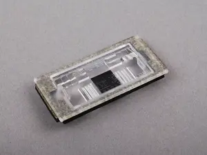 E46 License Plate Light Frame - Priced Each