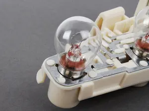 Outer Tail Light Bulb Socket - Left