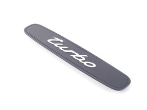 ES#1489704 - 99655130500A03 - "Turbo" Logo - Black - Emblem for rear shelf carpet - Genuine Porsche - Porsche