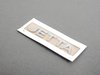 ES#7075 - 1k5853687739 - "Jetta" Emblem - Chrome rear stick on emblem - Genuine Volkswagen Audi - Volkswagen