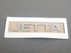 ES#7075 - 1k5853687739 - "Jetta" Emblem - Chrome rear stick on emblem - Genuine Volkswagen Audi - Volkswagen