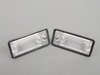 ES#2808801 - 8e0807430bKT - License Plate Light Assembly - Set - Does not include bulbs - Genuine Volkswagen Audi - Audi