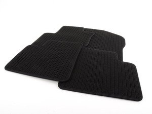 ES#1820929 - 66360243 - Carpet Floor Mats - Set Of Four - Black, with Mercedes-Benz logo on metal plate - Genuine Mercedes Benz - Mercedes Benz
